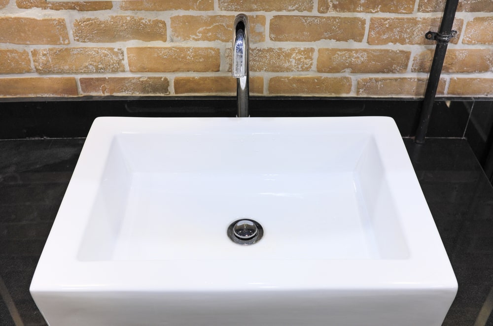 What is the cause of slow suction in the sewer pipe?
